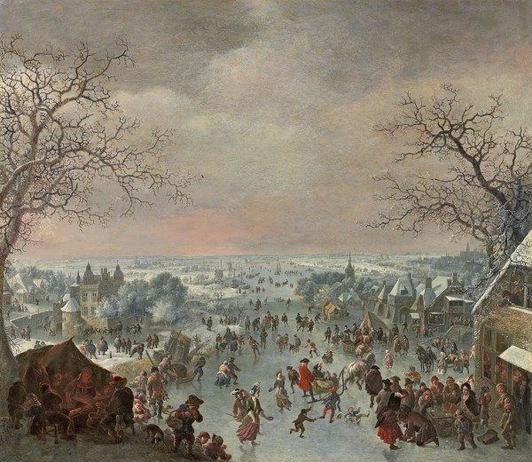 A winter landscape with figures skating and merrymaking by a tavern